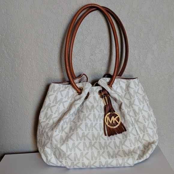 Michael Kors Handbags - Michael Kors Drawstring Purse White Brown